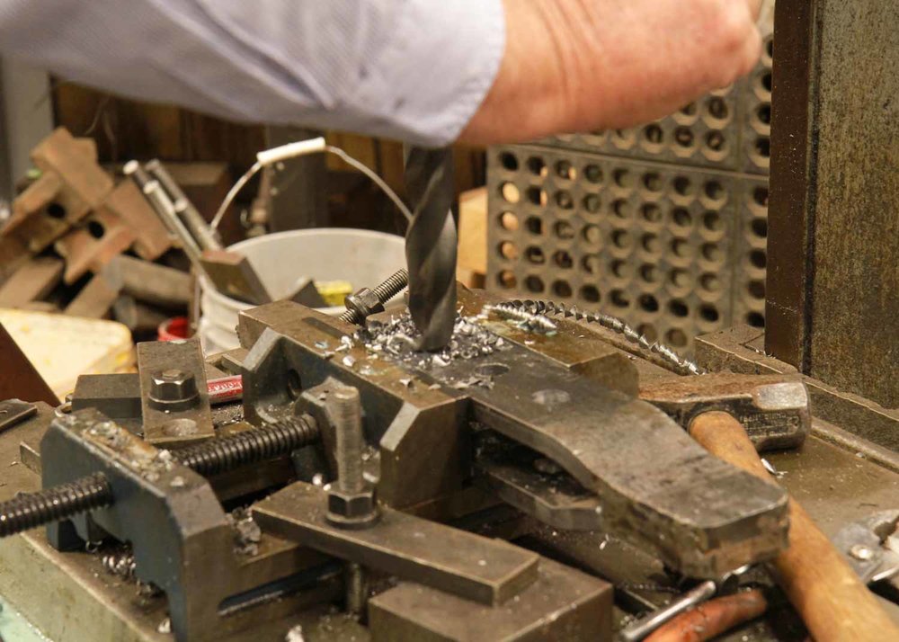 The large bit is now doing its work via the smaller pilot hole (1 of 1).jpg
