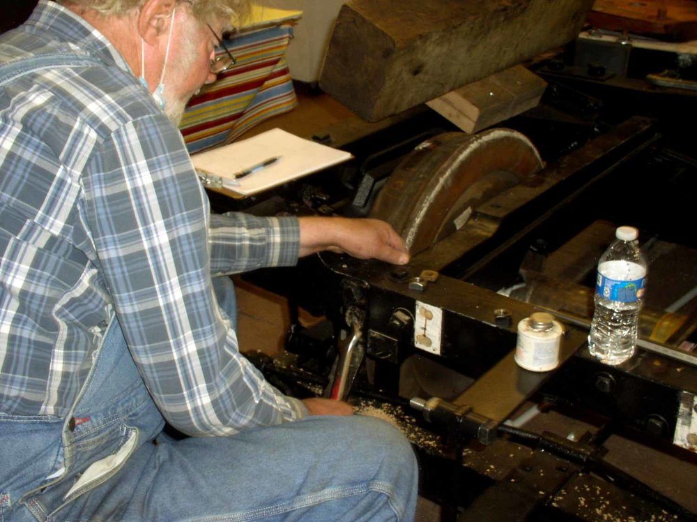 Working on the vintage passenger car truck (1 of 1).jpg