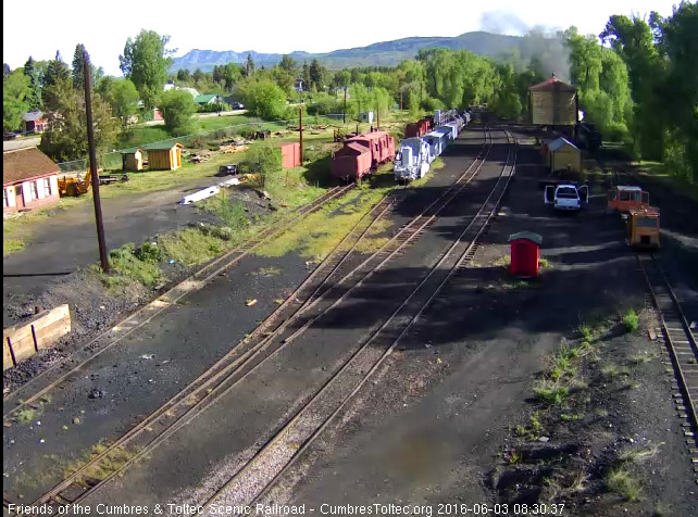 6.3.16 489 is now at the water tower and there are people working on the furthest speeder parked on the coal tower lead.jpg