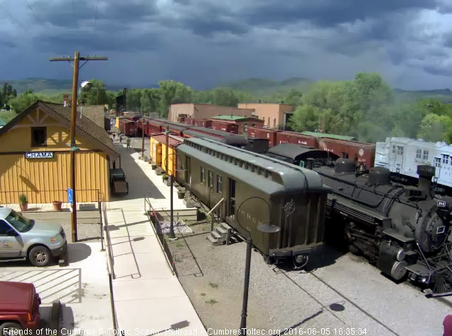 6.5.16 484 stops the train at the Chama depot.jpg