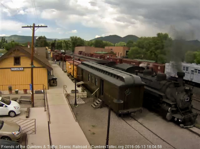 6.13.16 484 passes the station with storm clouds in the distance.jpg