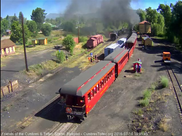 7.16.16 A number of people look on as the New Mexico passes the coaling tower.jpg