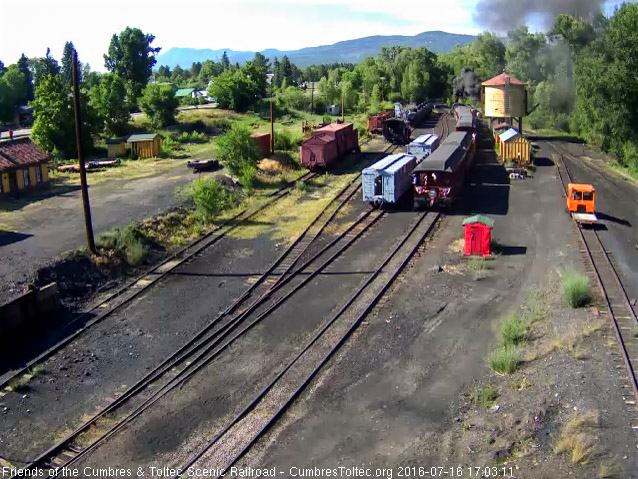 7.16.16 You can just make out the conductor, in his blue shirt, signaling to the engine for a good running brake test.jpg